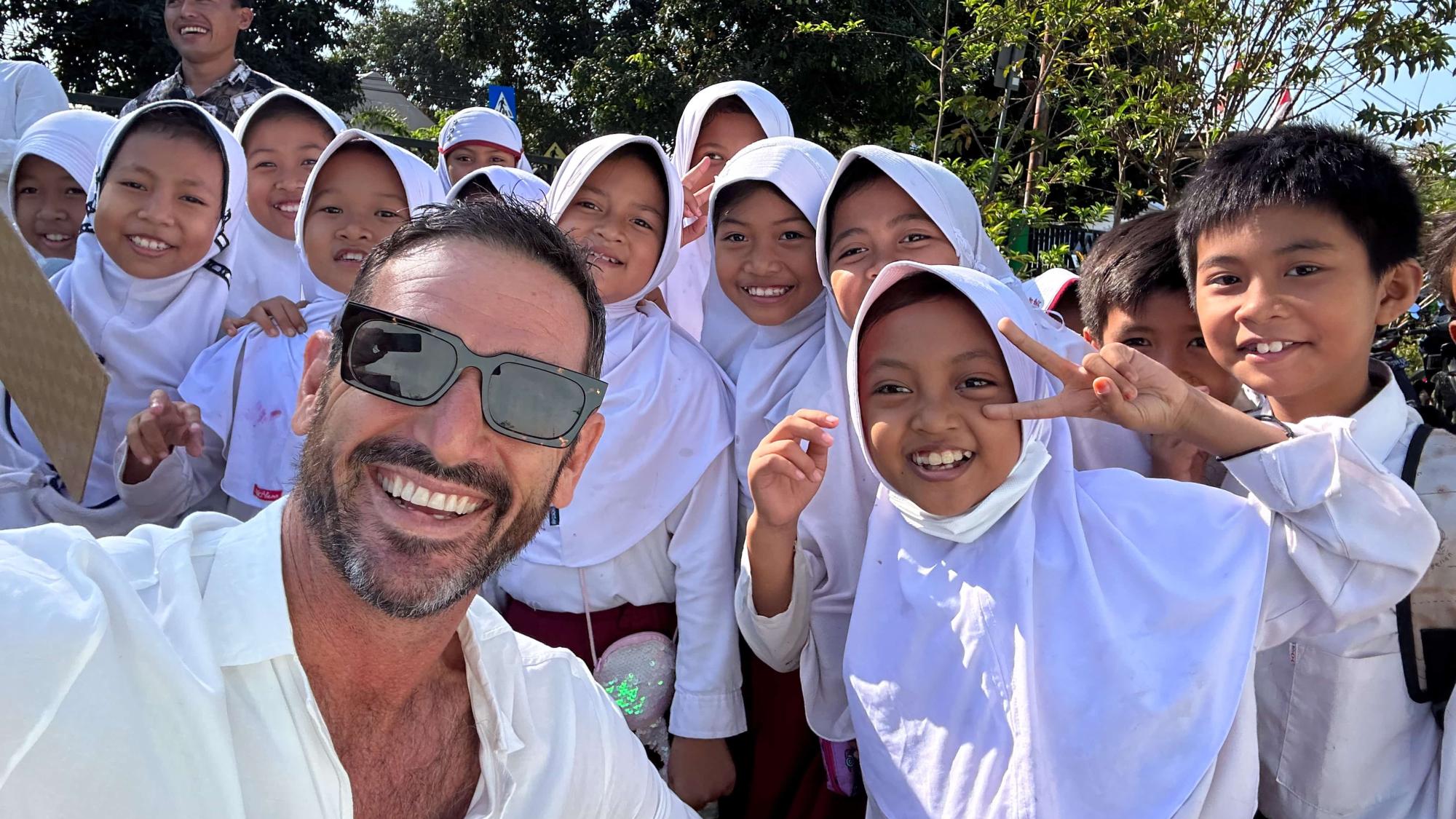 PADI AmbassaDiver Jason Chambers with a group of people.